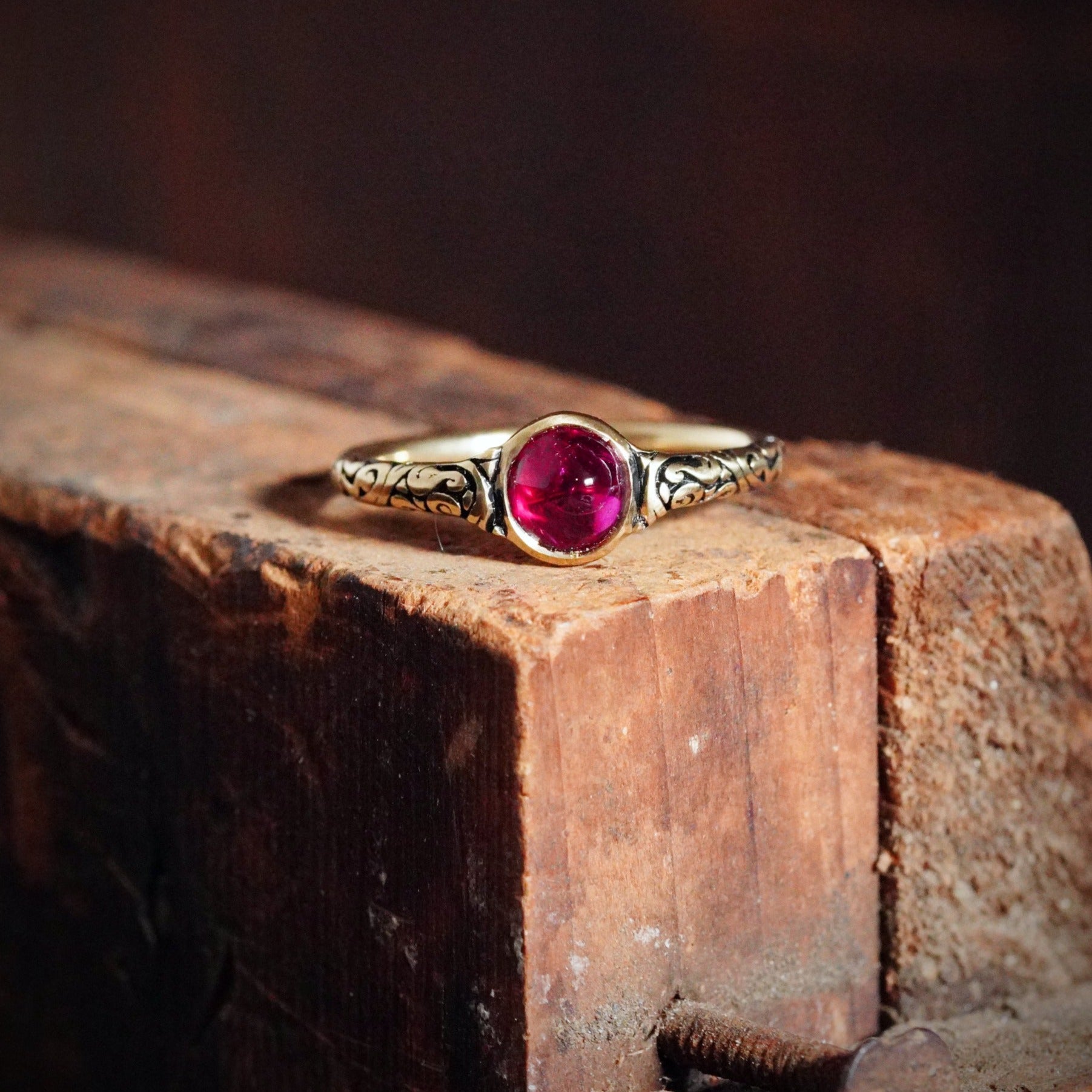 Jogani presents a captivating 0.96 ct cabochon-cut Burma ruby ring, featuring a no-heat gem of exceptional depth and radiance, cradled in 18K gold.