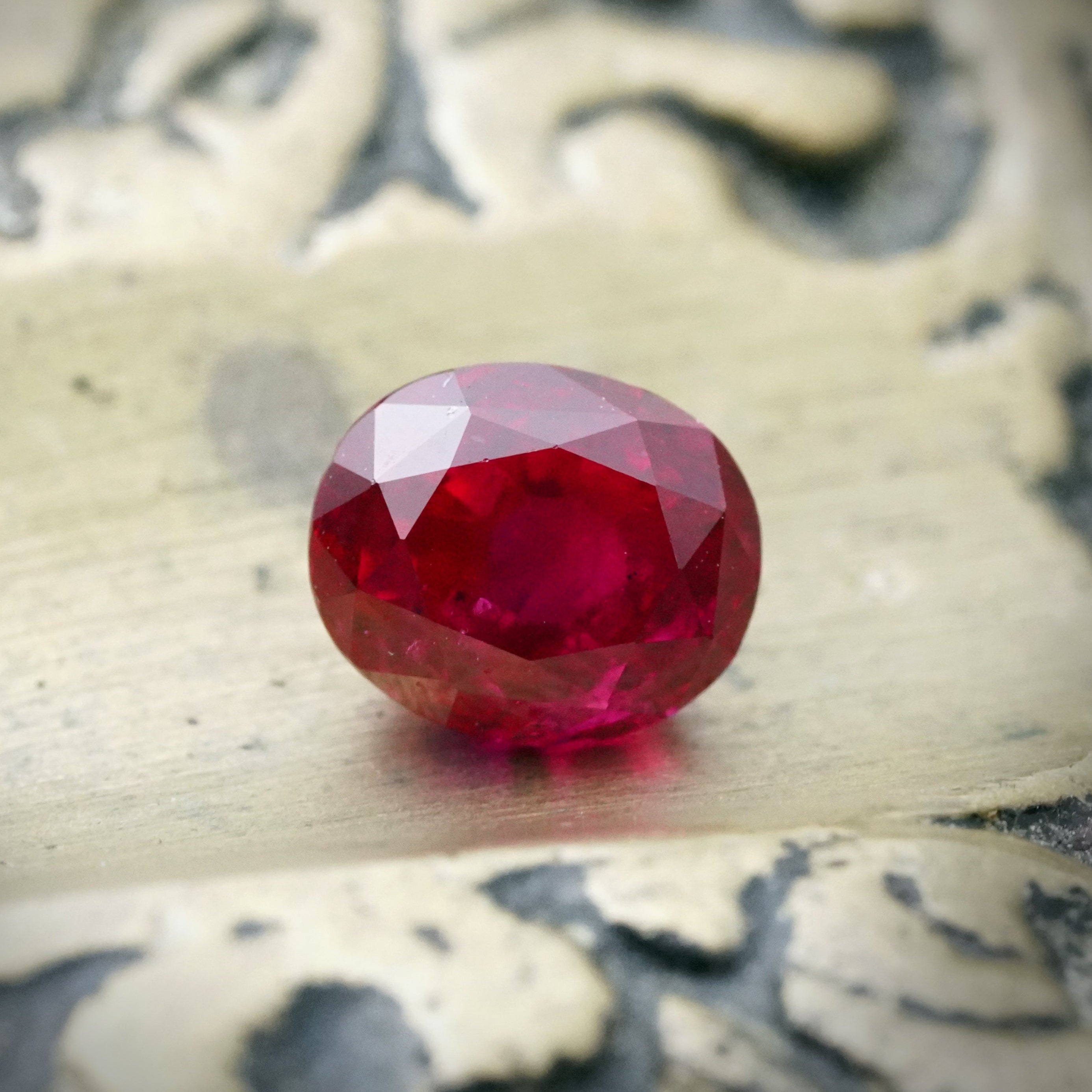 A 1.05-carat oval Burma ruby with a rich red hue, clean clarity, and no heat treatment, accompanied by AGL certificate number 1144921, presented by Jogani.