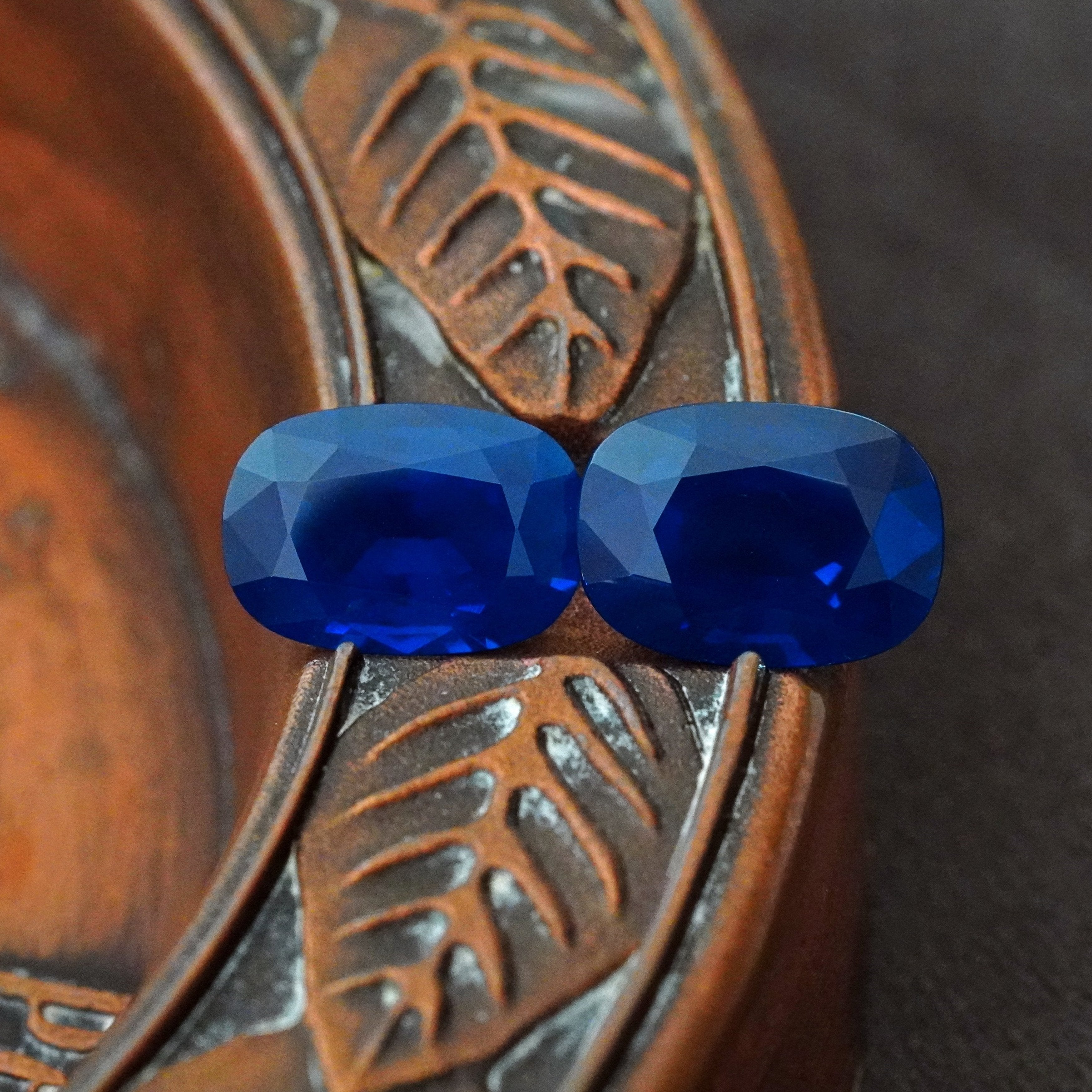 Jogani's rare and highly sought-after pair of cushion-cut Kashmir sapphires, totaling 10.03 cts, with exceptional blue color and no heat treatment. A collector’s dream.