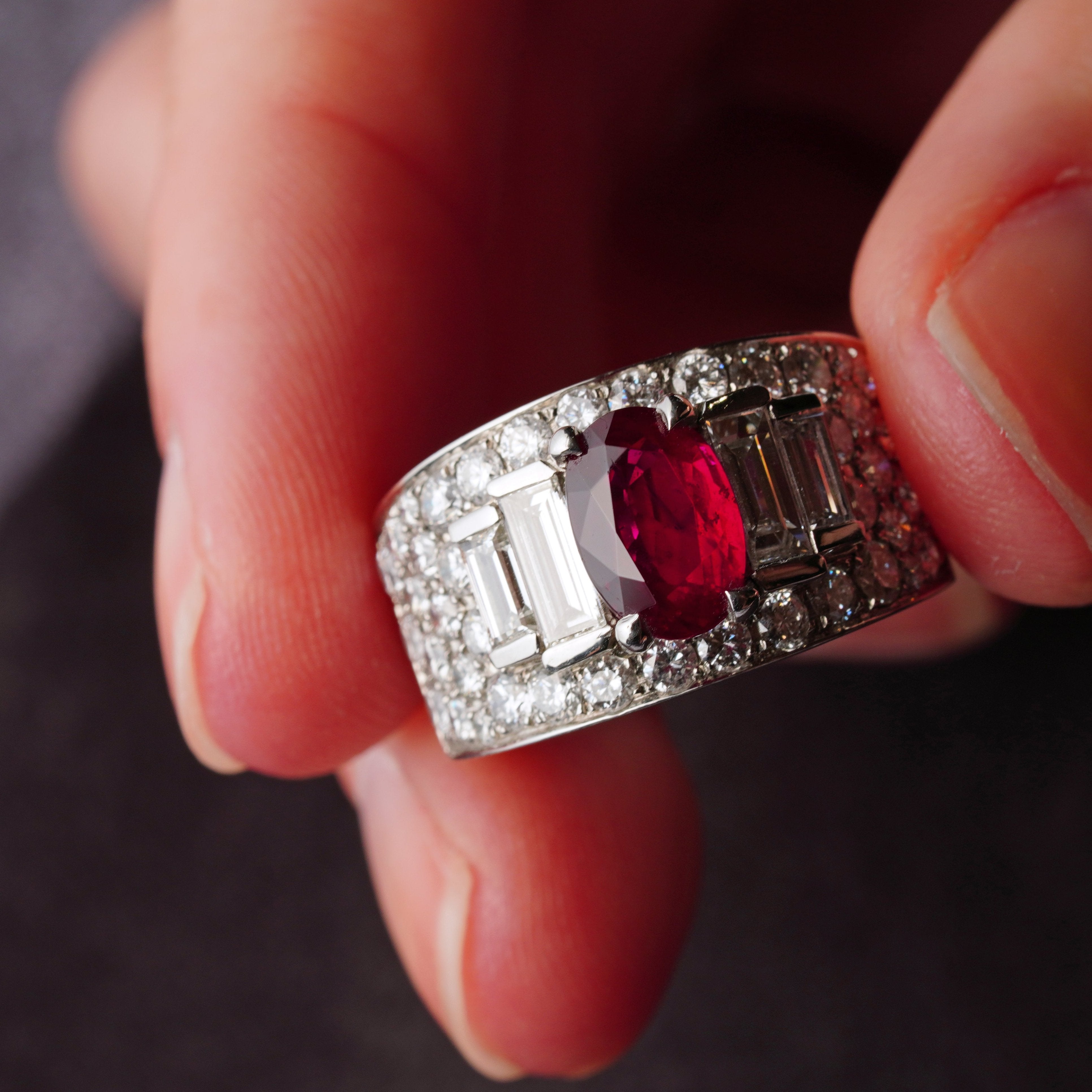 Detailed view highlighting the Deco-era design and the intricate open prong setting of the 2.02 ct Burmese ruby ring by Bulgari. Acquirable from Jogani.