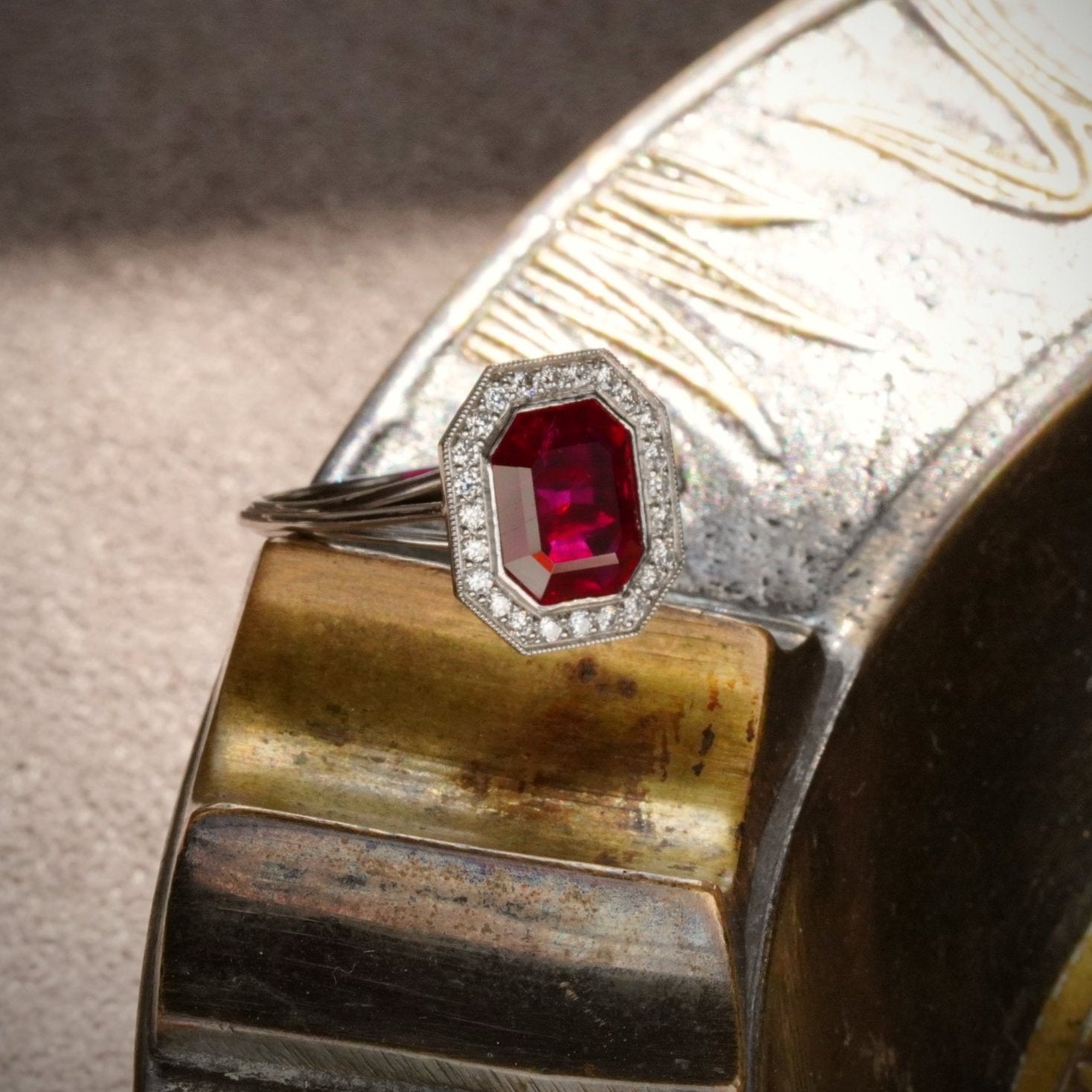 Timeless sophistication: a 2.13 ct step-cut Burma ruby ring, sold by Jogani. A no-heat red ruby encased in a custom platinum bezel setting.