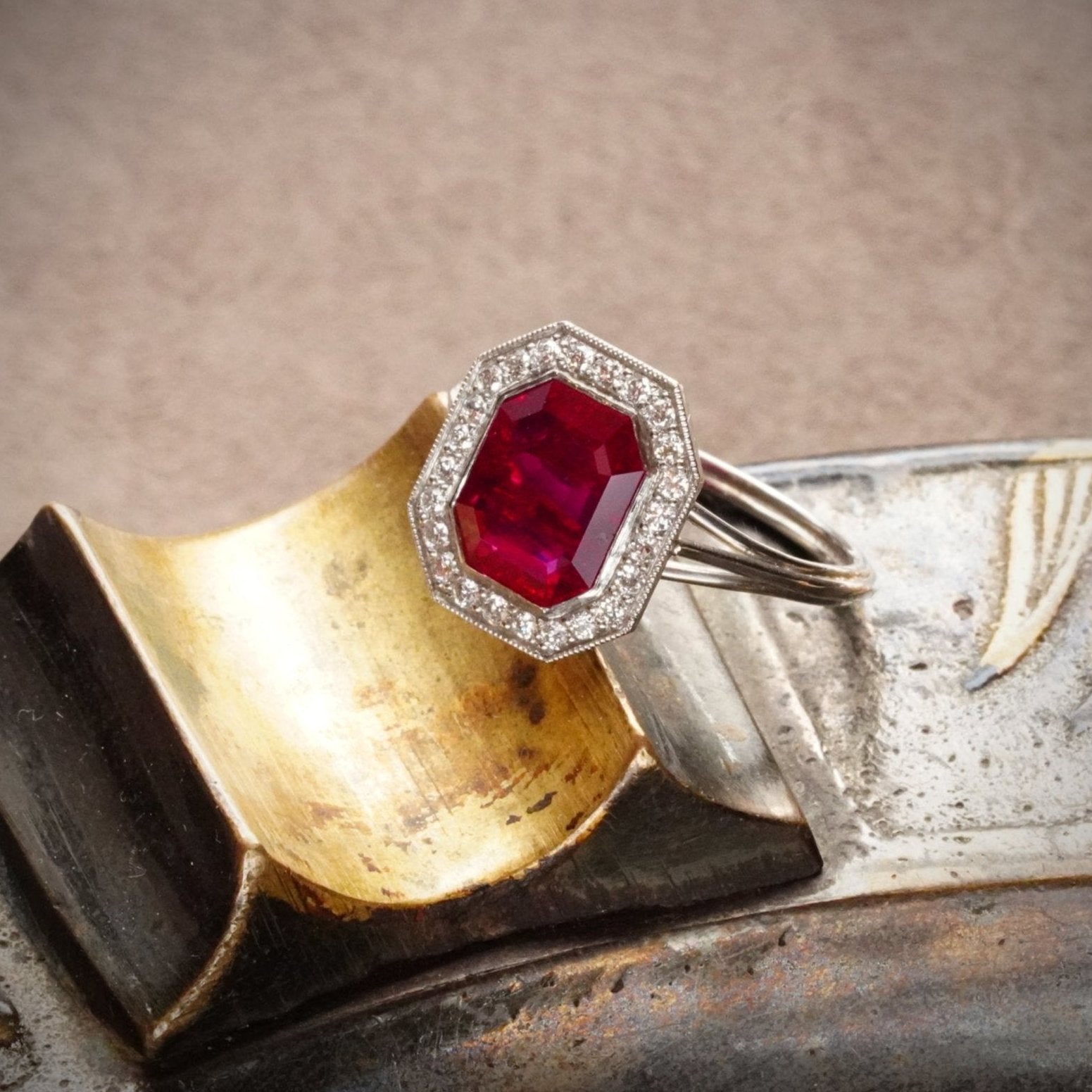 A striking 2.13 ct Burma ruby ring, step-cut and no-heat, available from Jogani. Set in platinum with diamond accents, perfect for collectors and investors.