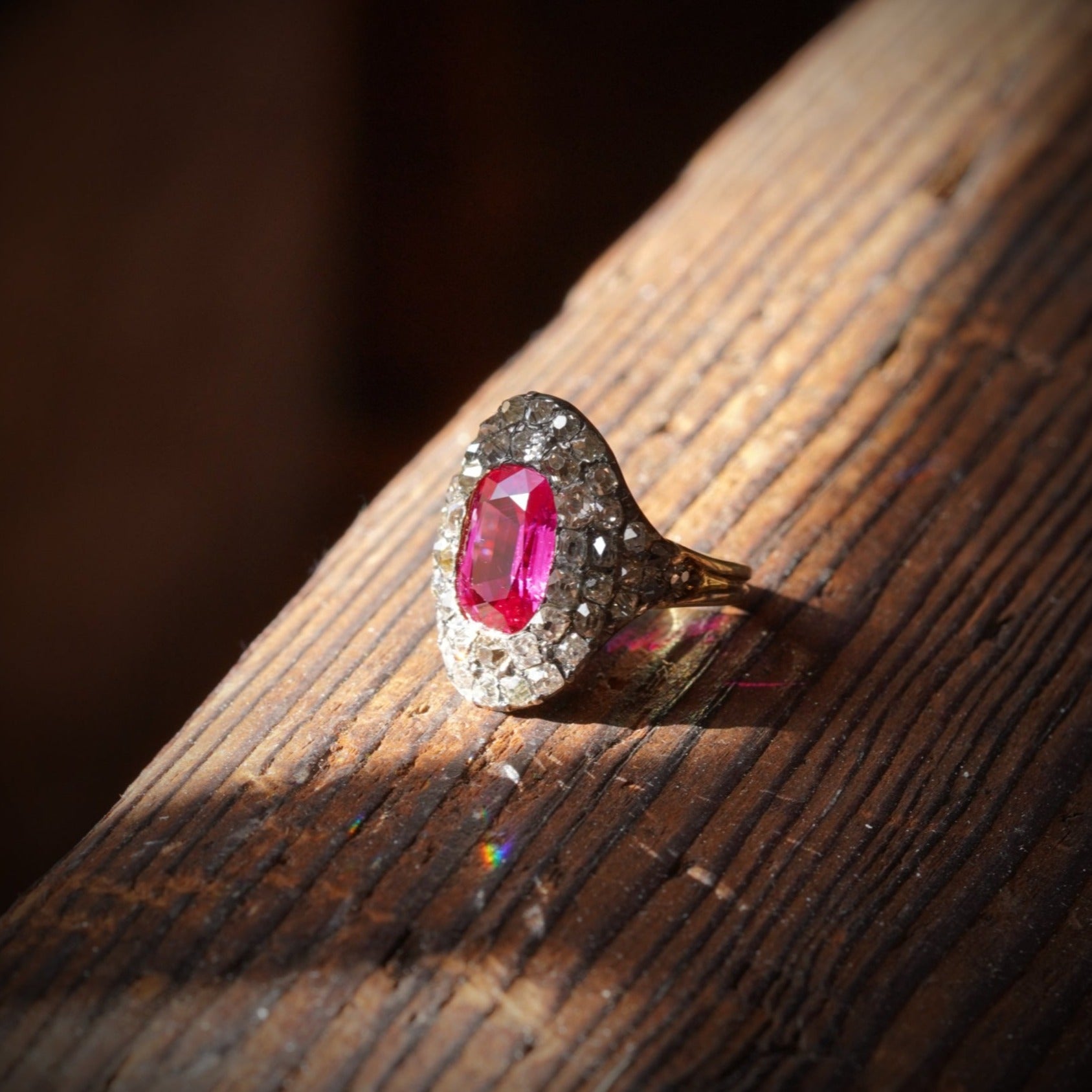 This radiant 3.12 ct no-heat Burma Ruby Ring, surrounded by antique table-cut diamonds, embodies old-world luxury and fine craftsmanship. Available now through Jogani.