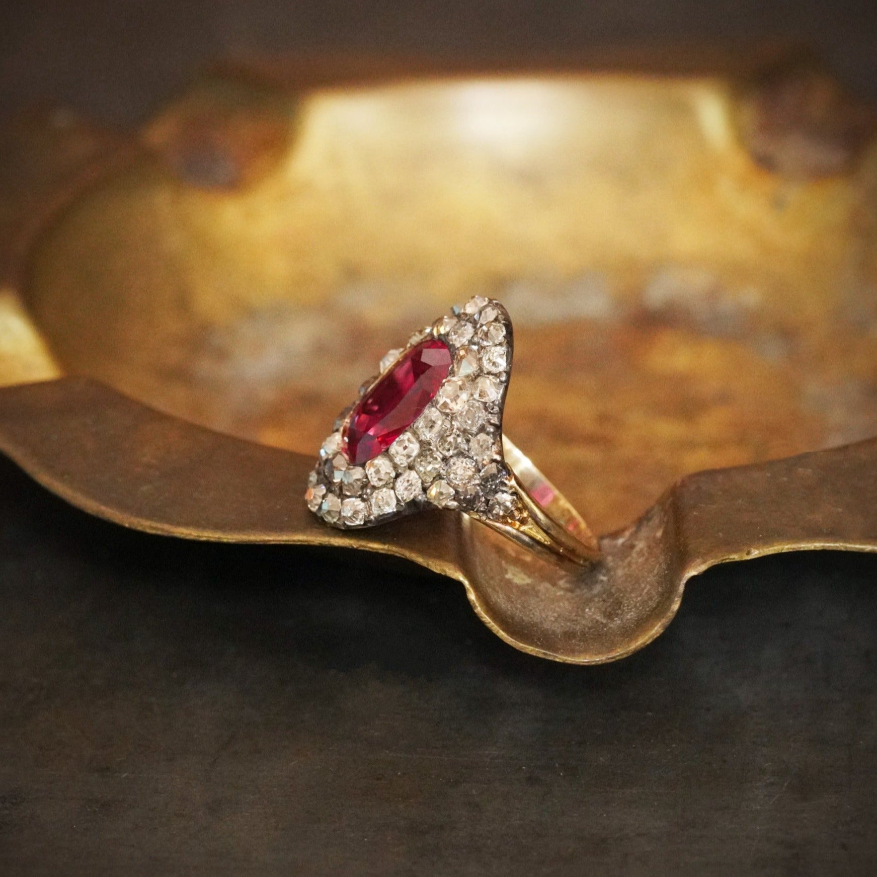 A striking Georgian-era ring featuring a 3.12 ct pink-red cushion-cut Burma Ruby, glowing with unmatched brilliance. Expertly sourced and available with Jogani.