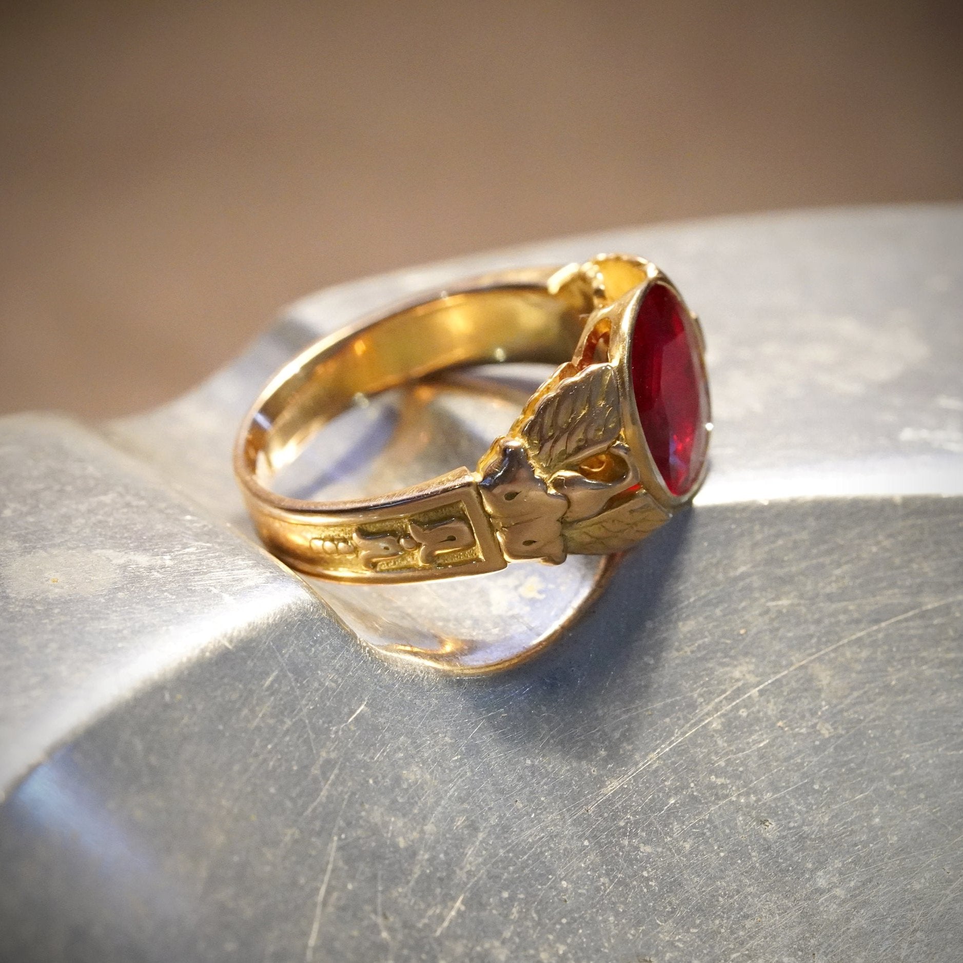 Side View of Antique Cushion Cut Burma Ruby Ring, showcases the 3.21 ct unheated Burmese ruby set in 18K yellow gold by Jogani.