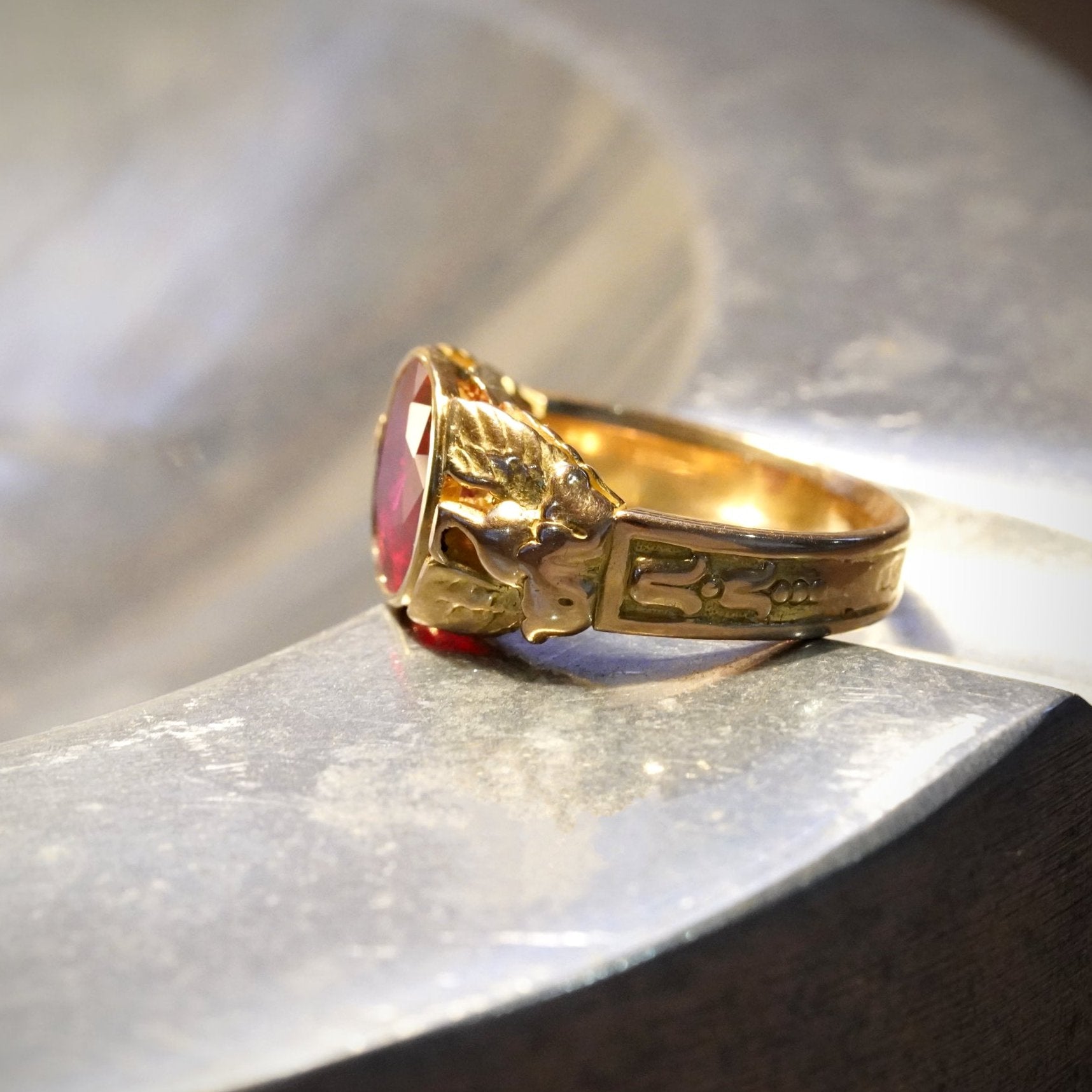 Side View of Antique Cushion Cut Burma Ruby Ring, showcases the 3.21 ct unheated Burmese ruby set in 18K yellow gold by Jogani.