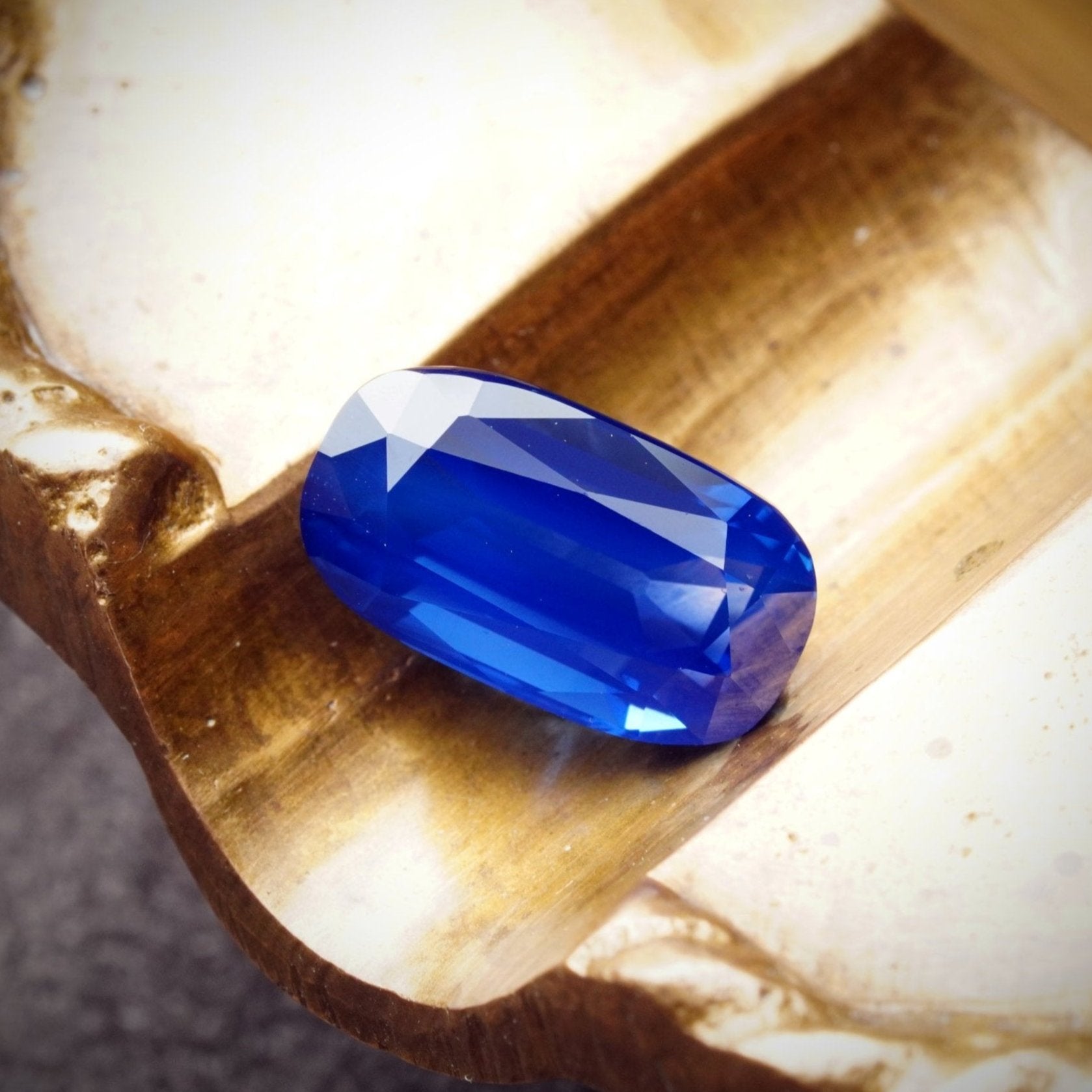 A 3.86 ct no-heat Kashmir sapphire from Jogani, featuring a striking royal blue hue in an elongated cushion cut—ideal for collectors and designers.