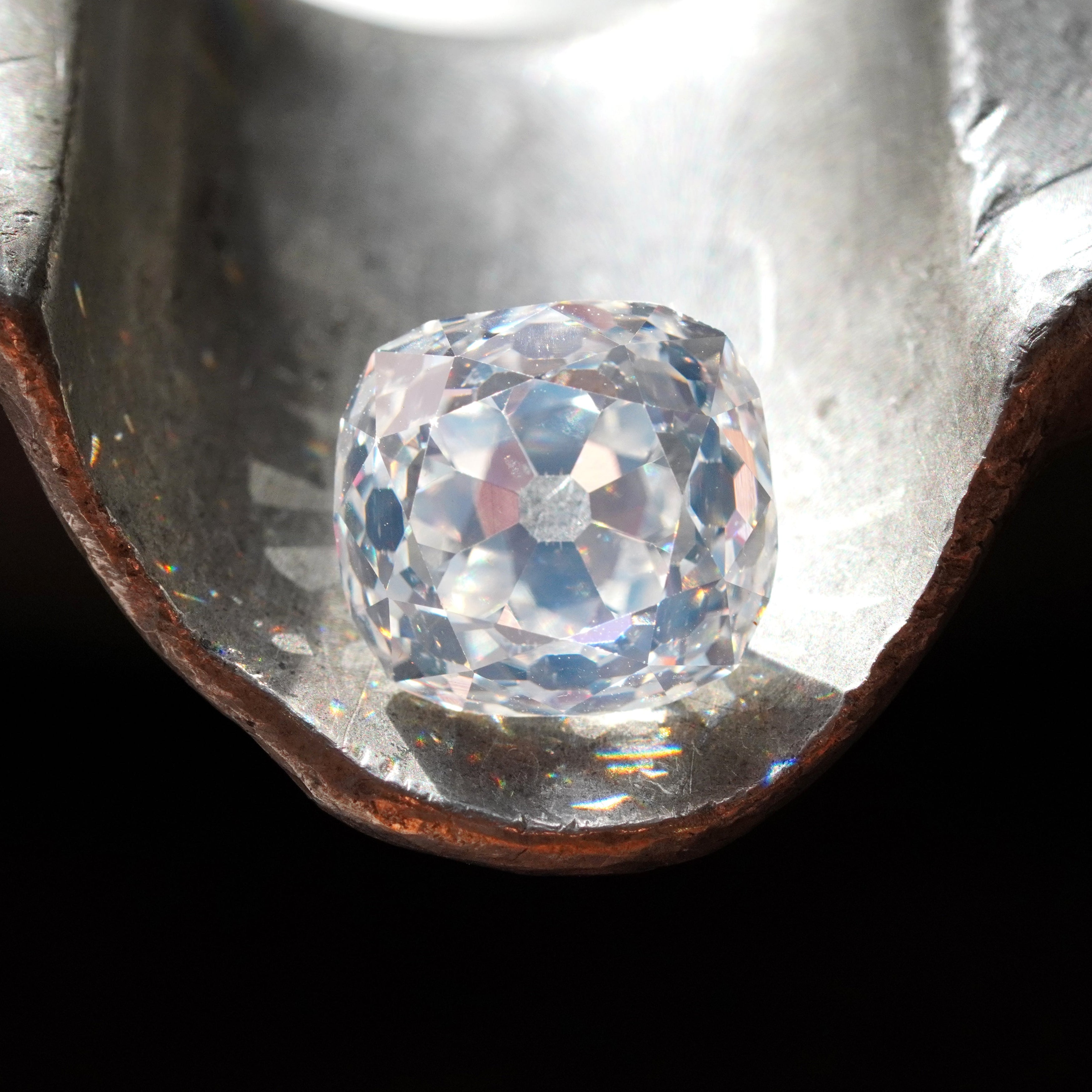 Sparkly rare 4.02 ct Old Mine Cut white diamond with L color and VS2 clarity, certified by GIA. Its antique faceting enhances its brilliance and charm, sold by Jogani.