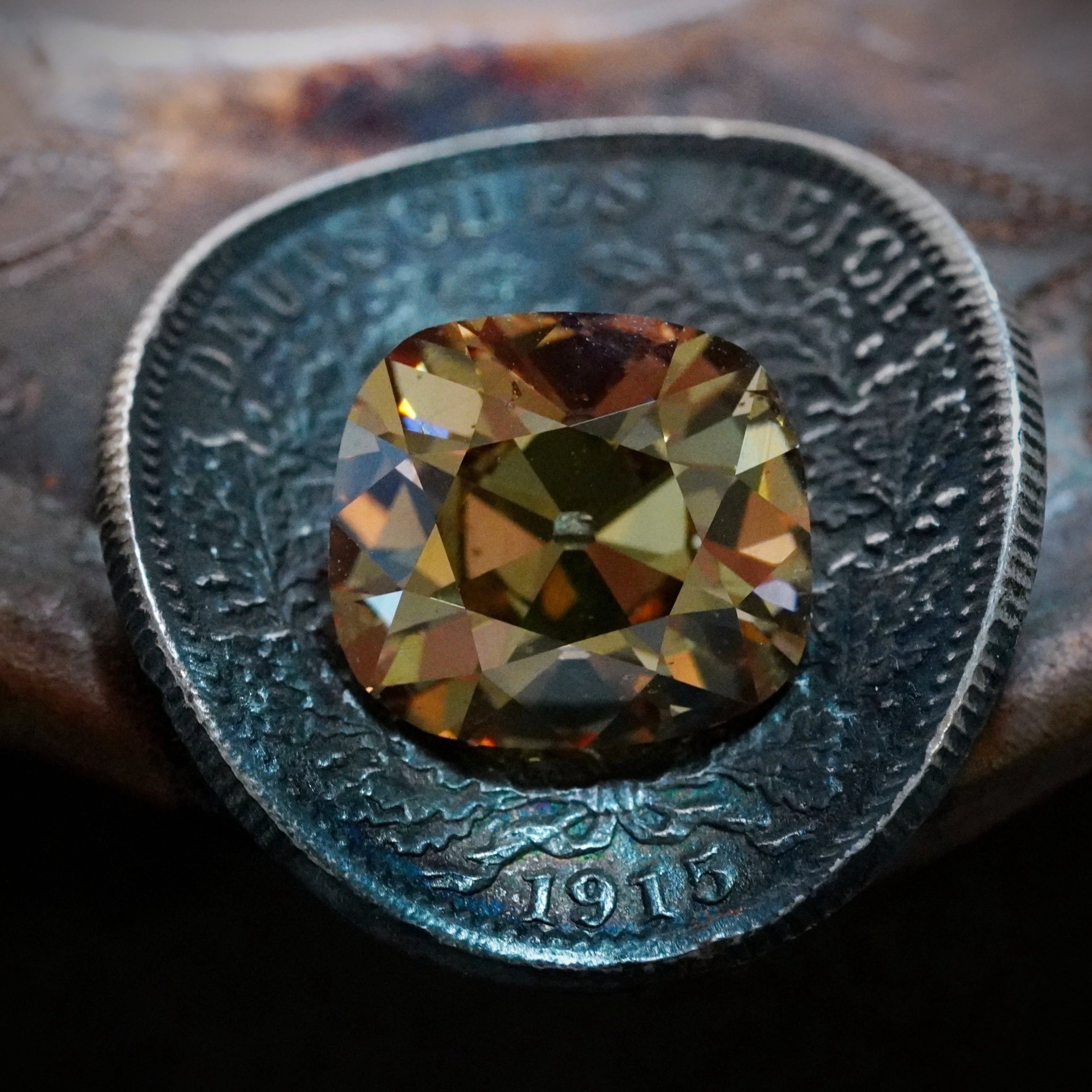 A remarkable 5.02 ct Old Mine cut colored diamond, available with Jogani, displaying a rich, warm hue and vintage brilliance sought after by collectors and jewelry artisans alike.