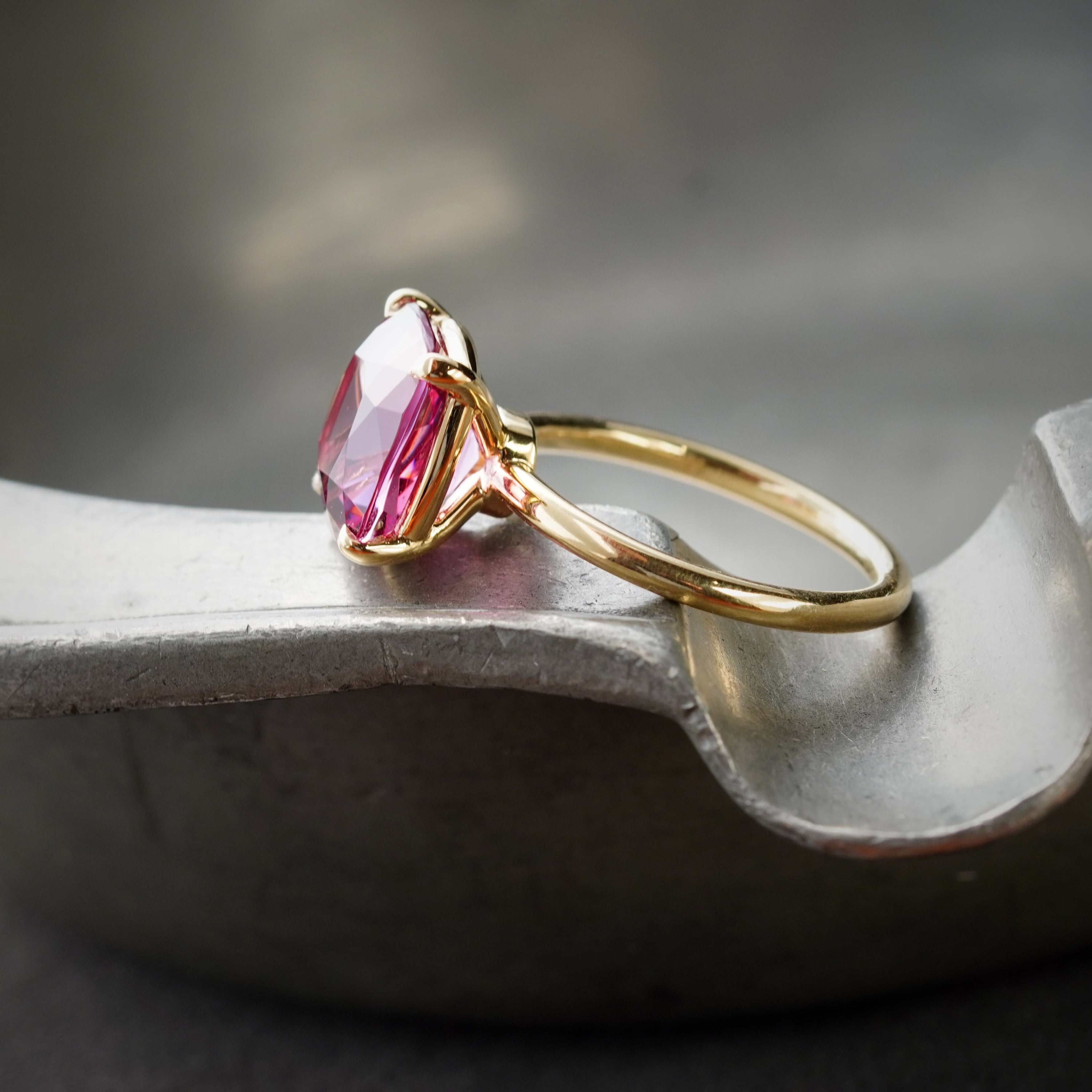 A collector’s dream—this 5.76 ct cushion-cut Burma spinel ring radiates pure elegance with its vivid pink hue. Designed by Jogani, it’s a masterpiece of fine jewelry craftsmanship.