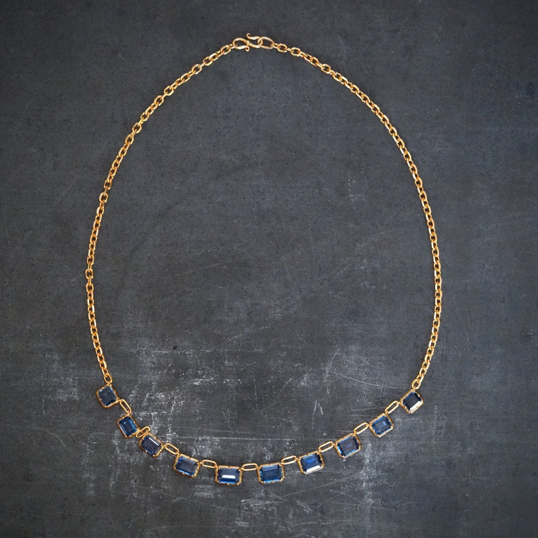 A meticulously crafted Montana Sapphire Necklace, featuring 7.0 total carats of no-heat sapphires in elegant emerald cuts, available with Jogani—ideal for jewelry connoisseurs and investors.