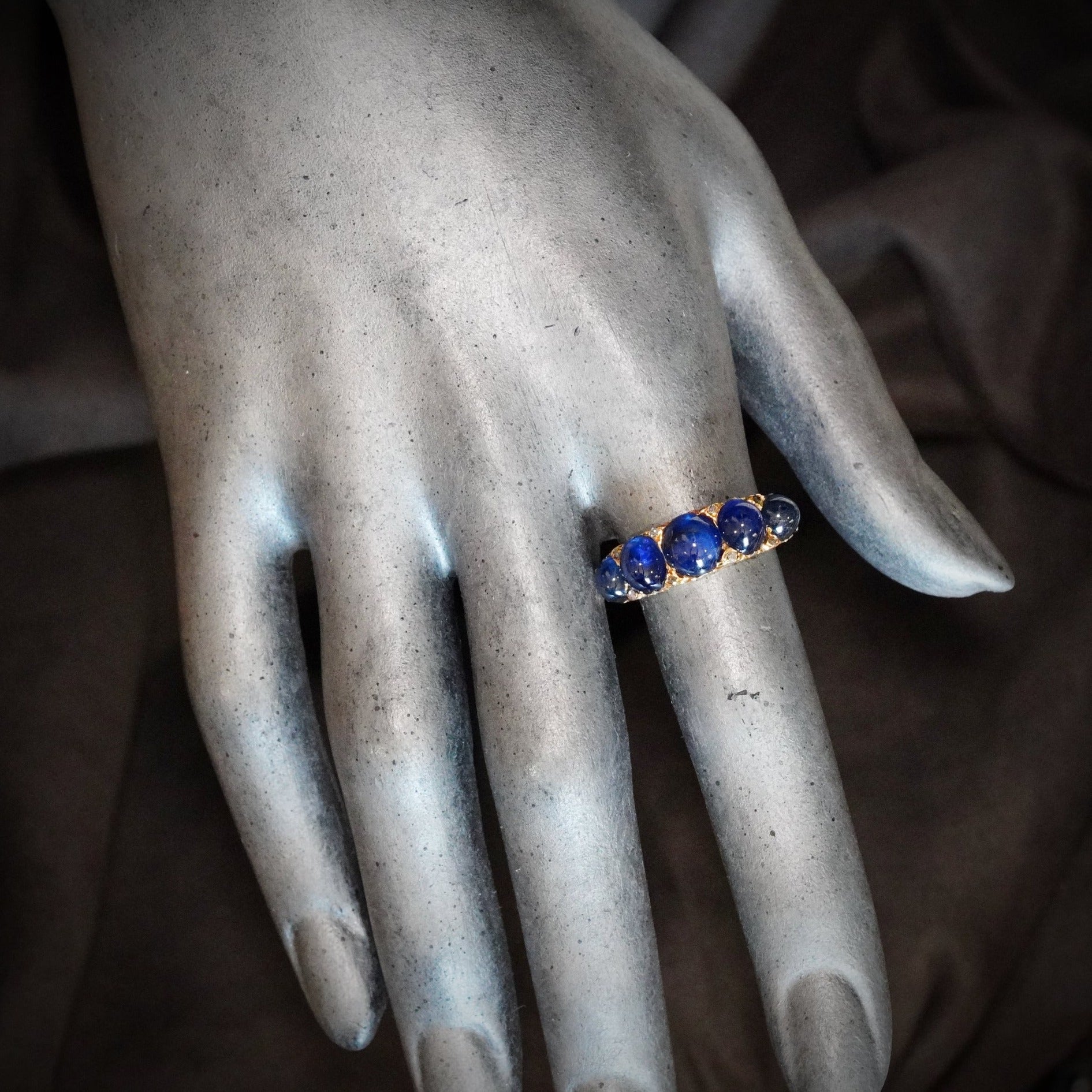 Victorian Azure Magic: A Five-Sapphire Ring Set in 18K Yellow Gold