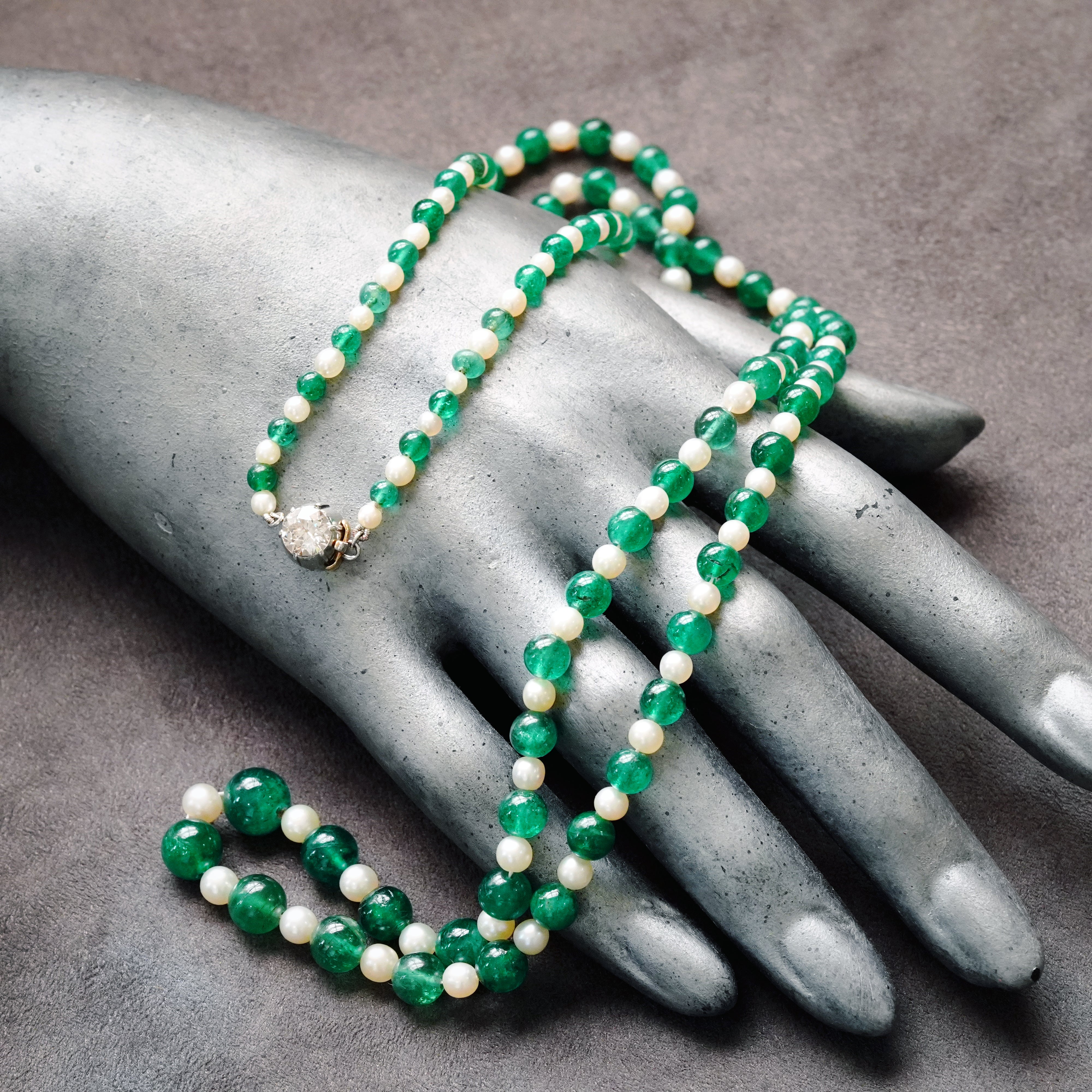 Jogani presents this luxurious Tiffany & Co. necklace with luminous natural saltwater pearls and rare Russian emeralds. GIA-certified and perfect for discerning collectors and investors.