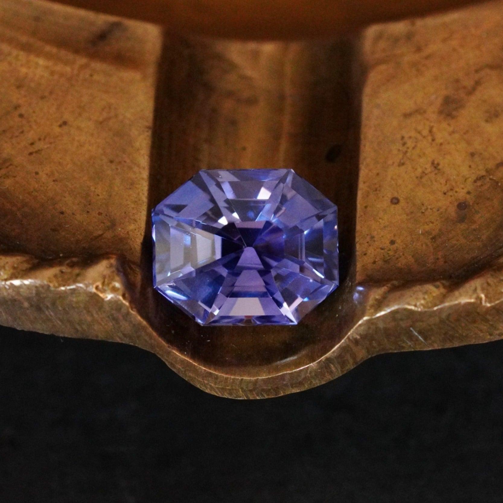 Periwinkle Elegance: The 7.61 CT Asscher Cut No Heat Ceylon Sapphire - A Gemstone of Royal Allure and Timeless Beauty - Jogani