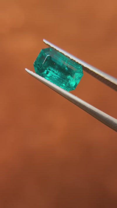 An exquisite 2.18 ct Colombian emerald, featuring a step-cut design that enhances its natural vibrancy—now offered by Jogani.