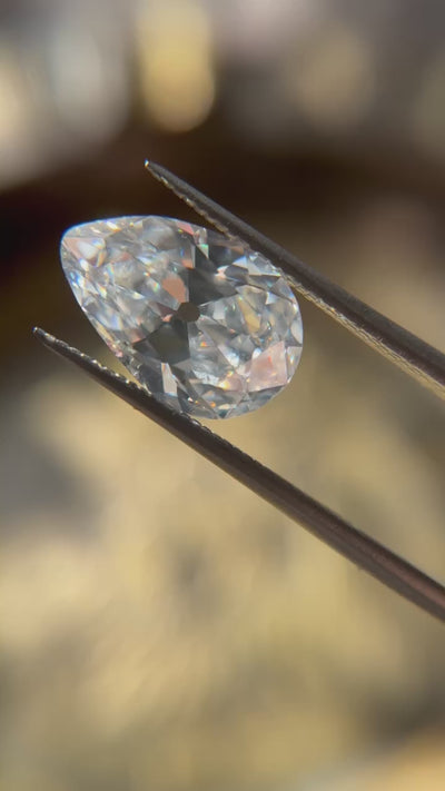 A stunning 4.20 ct pear cut white diamond with E color and VS1 clarity, measuring 13.78 x 9.11 x 5.25 mm. GIA certified, showcasing exceptional brilliance.