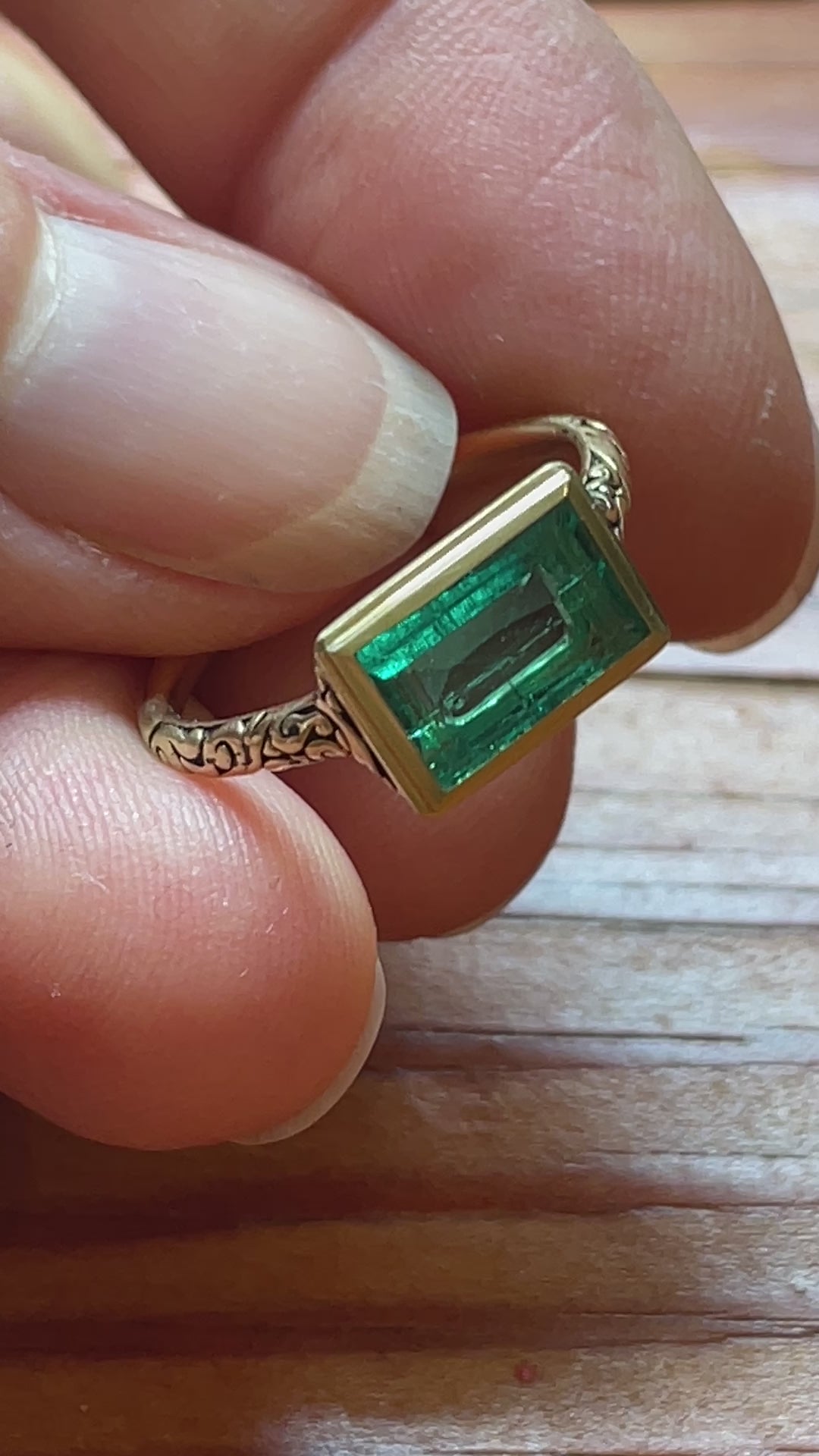 High-quality and captivating Colombian emerald step cut ring