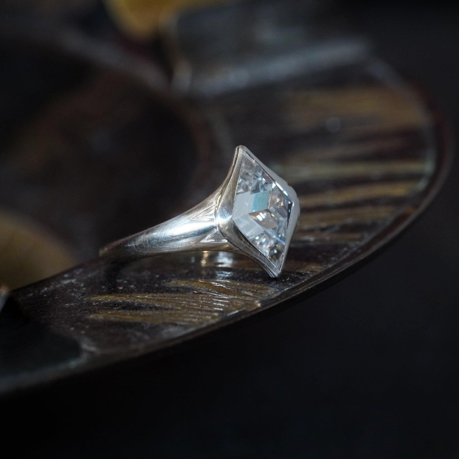 Lozenge step cut diamond: 2.12 carat diamond radiating elegance and beauty