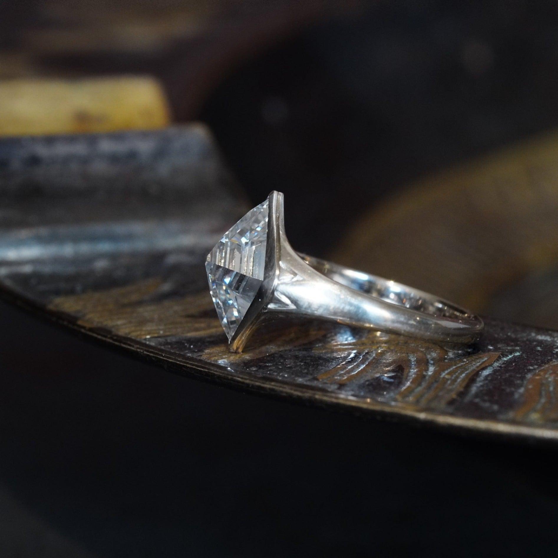 High-quality and captivating lozenge step cut diamond with Renaissance revival design
