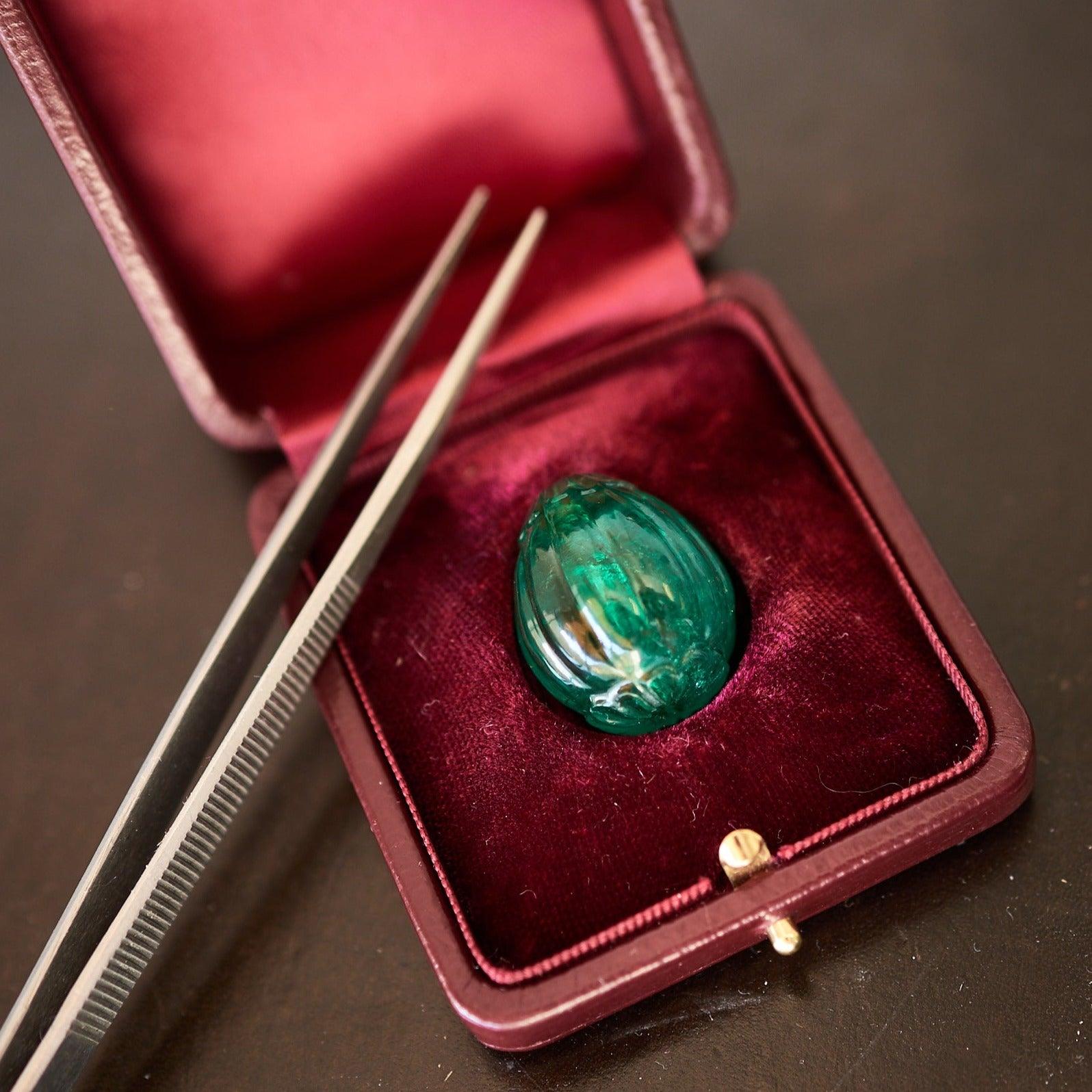 Timeless Beauty: The Majestic Carved Drop Emerald Bead from