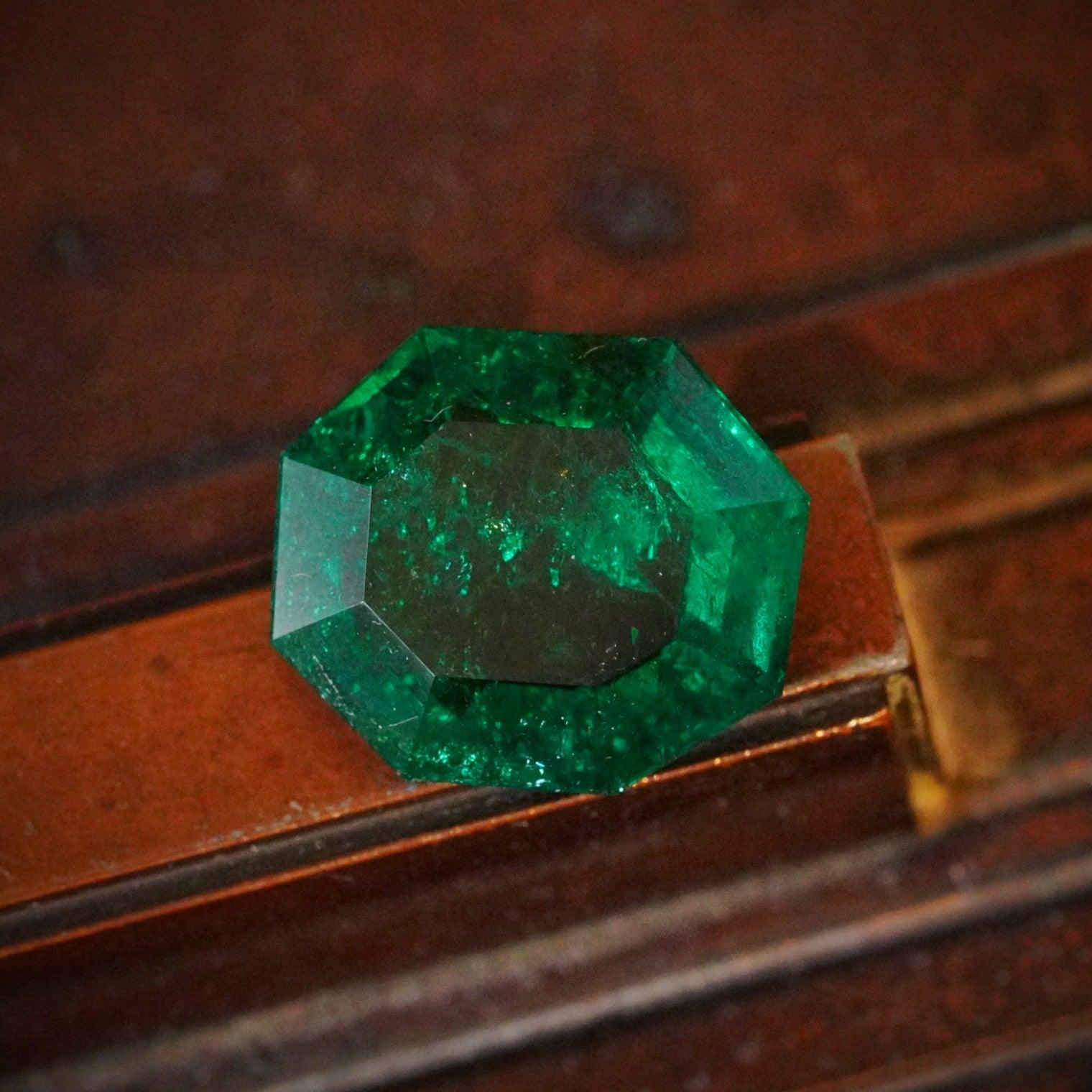 Anup Jogani's masterpiece: Captivating 10.97 CT minor oil Colombian emerald with verdant hues and timeless beauty