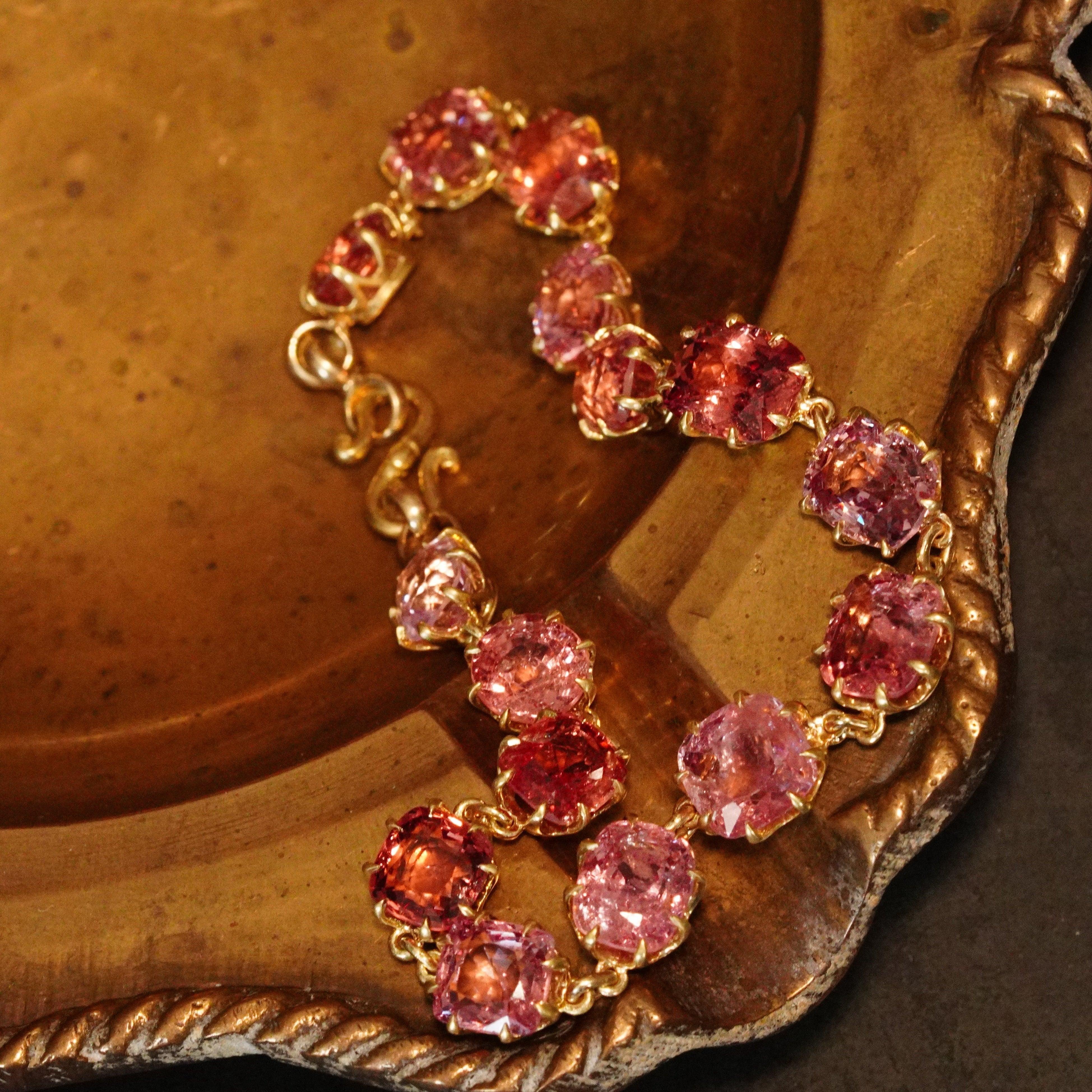 Anup Jogani's masterpiece: Pink Sunset bracelet featuring a stunning 27 CT cushion cut pink spinel in 18K gold